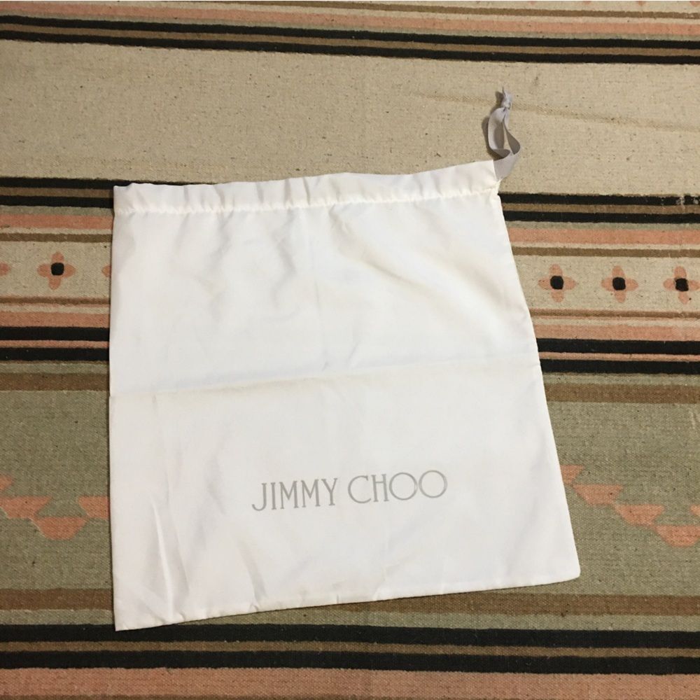 Jimmy Choo White Dustbag medium approx 13” x 14”
Good for travel shoes